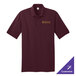 A maroon Port & Company polo shirt with a logo on it.