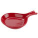 A red bowl with a handle.