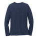 A Port & Company women's navy blue long sleeve shirt.