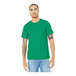 A man wearing a Bella + Canvas heather kelly green t-shirt.