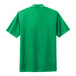 A green Nike polo shirt.
