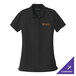 A small women's black Port Authority polo shirt with gold embroidery on the logo.