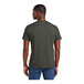 A man wearing a District Deepest Gray short sleeve T-shirt.