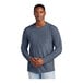 A man wearing a heathered navy District long sleeve t-shirt.