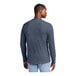 A man wearing a heathered navy District long sleeve t-shirt.