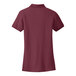 A Port Authority women's burgundy short sleeve polo shirt.