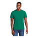 A man wearing a District Unisex Jewel Green short sleeve t-shirt.