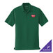 A deep forest green Port Authority polo shirt with a logo on it.