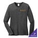 A Port & Company women's long sleeve dark heather grey shirt on a counter.