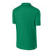 A Kelly green Sport-Tek polo shirt.