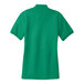 A Port Authority kelly green polo shirt for women.
