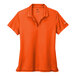 An orange Nike polo shirt with a white Nike logo.
