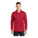 A man wearing a deep red Sport-Tek long sleeve polo shirt.