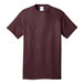 A Port & Company maroon short sleeve t-shirt.