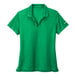 A green Nike Dri-Fit polo shirt with a white logo of a swoosh.