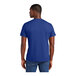 A man wearing a District Deep Royal blue T-shirt.