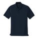 A unisex navy blue Port Authority polo shirt.