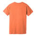 A Bella + Canvas heather orange t-shirt.
