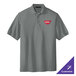 A Port Authority Cool Gray Silk Touch Pique Polo shirt with a logo on the chest.