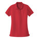 A Port Authority rich red short sleeve polo shirt for women.