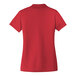 A Port Authority women's rich red short sleeve polo shirt.