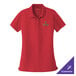 A medium rich red Port Authority polo shirt with green text.