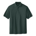 A dark green Port Authority Silk Touch Pique Polo shirt.