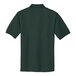 The back of a dark green Port Authority polo shirt.