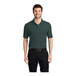 A man wearing a dark green Port Authority® silk touch polo shirt.