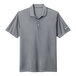 A grey Nike polo shirt with a white Nike swoosh on the sleeve.