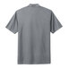 A grey Nike short sleeve polo shirt with a collar.