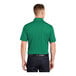 A man wearing a kelly green Sport-Tek polo shirt.