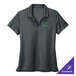 A women's Nike anthracite polo shirt with green embroidery of a logo.