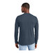 A man wearing a District New Navy long sleeve T-shirt.