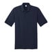 A dark blue Port & Company polo shirt with short sleeves.
