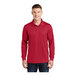 A man wearing a deep red long sleeve Sport-Tek polo shirt.