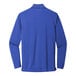 A medium unisex Port Authority long sleeve polo shirt in blue.