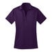 A Port Authority bright purple women's polo shirt with a collar.