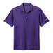 A purple Nike polo shirt with a white Nike logo on the sleeve.