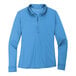 A Port Authority Carolina Blue long sleeve women's polo shirt.