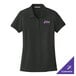 A black Port Authority women's polo shirt with pink custom text that reads "Stix" on the front.