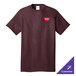 A Port & Company maroon short sleeve t-shirt with a logo on it.