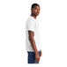 A man wearing a white District t-shirt.
