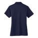 A back view of a dark blue Port Authority women's polo shirt.