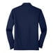 A back view of a navy Port Authority long sleeve polo shirt.