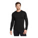 A man wearing a black Nike Dri-FIT long sleeve T-shirt.