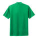 A green Nike polo shirt.