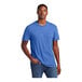 A man wearing a District Heathered Royal blue T-shirt.