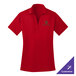 A red Port Authority women's polo shirt with a green logo.