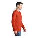 A medium orange Port & Company long sleeve T-shirt.